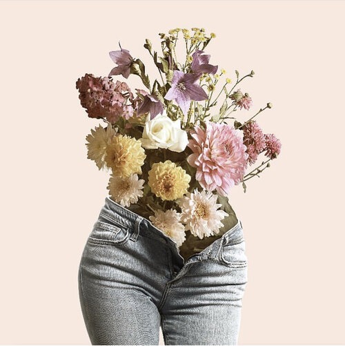 flower bouquet coming out of a pair of jeans